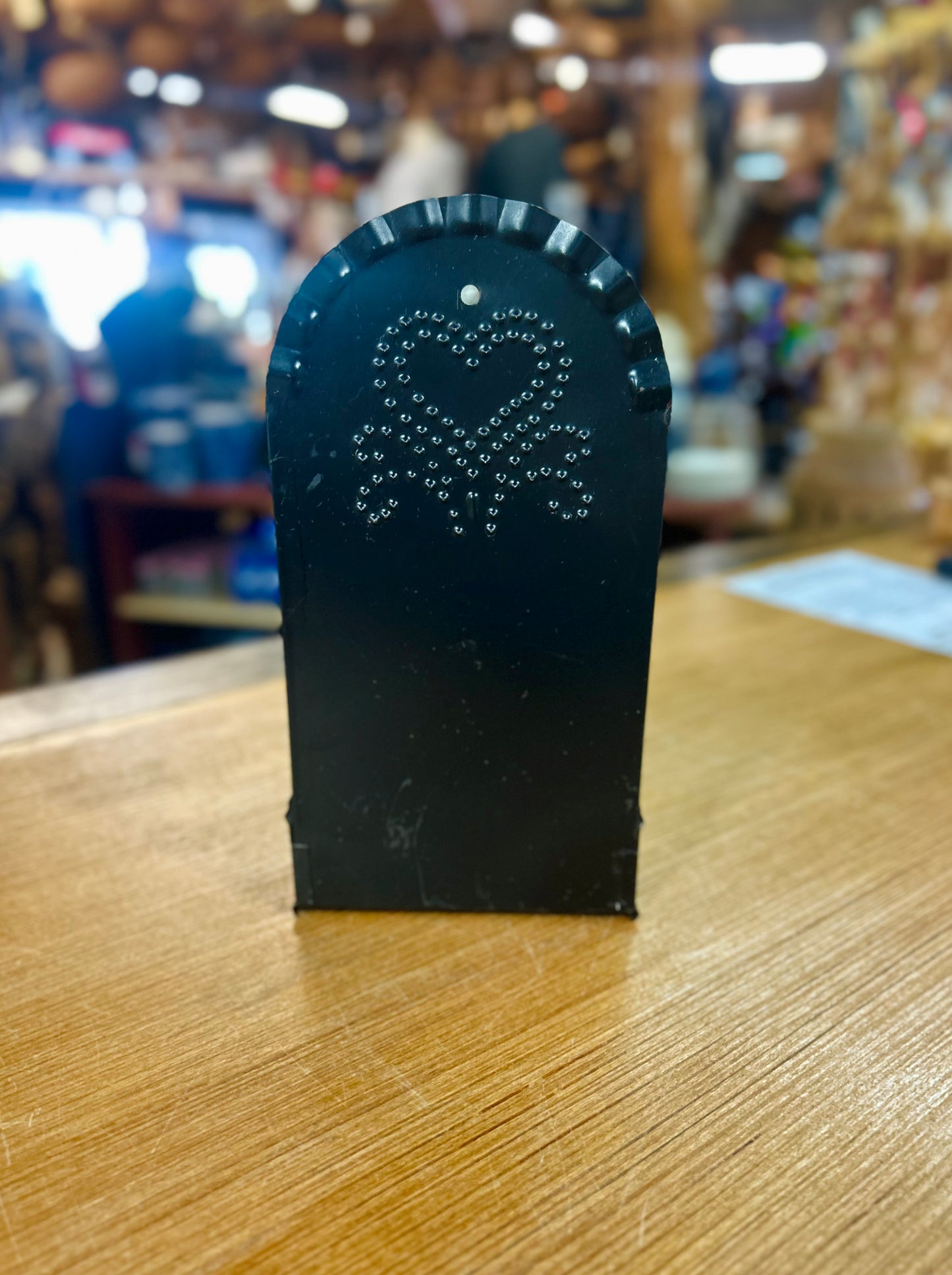 Punched Tin Wall Sconce With Candle Holder Featuring a Black Finish And Heart Design