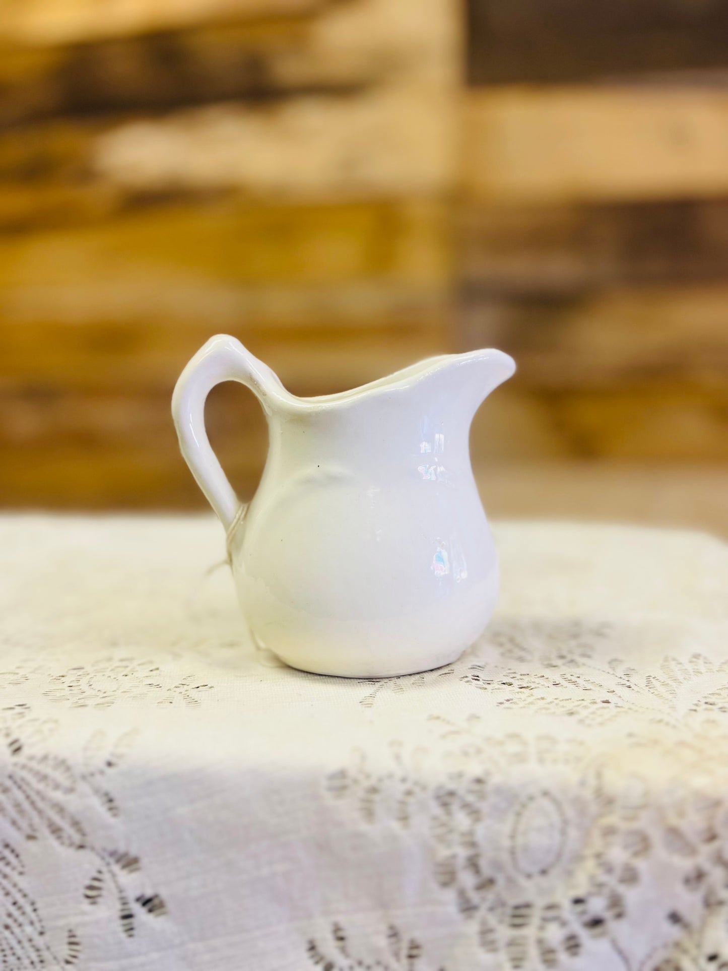Vintage Cash Family Pottery Pitcher with Floral Design