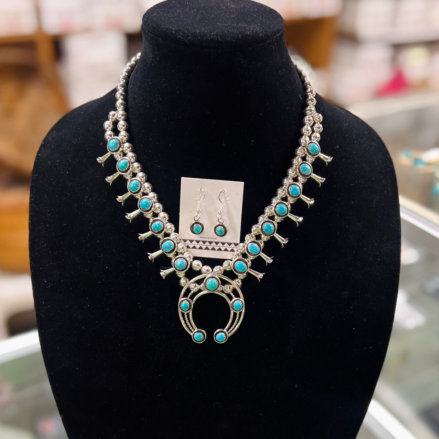 The Trudy Genuine Turquoise Sterling Silver Squash Blossom Necklace and Earrings Set