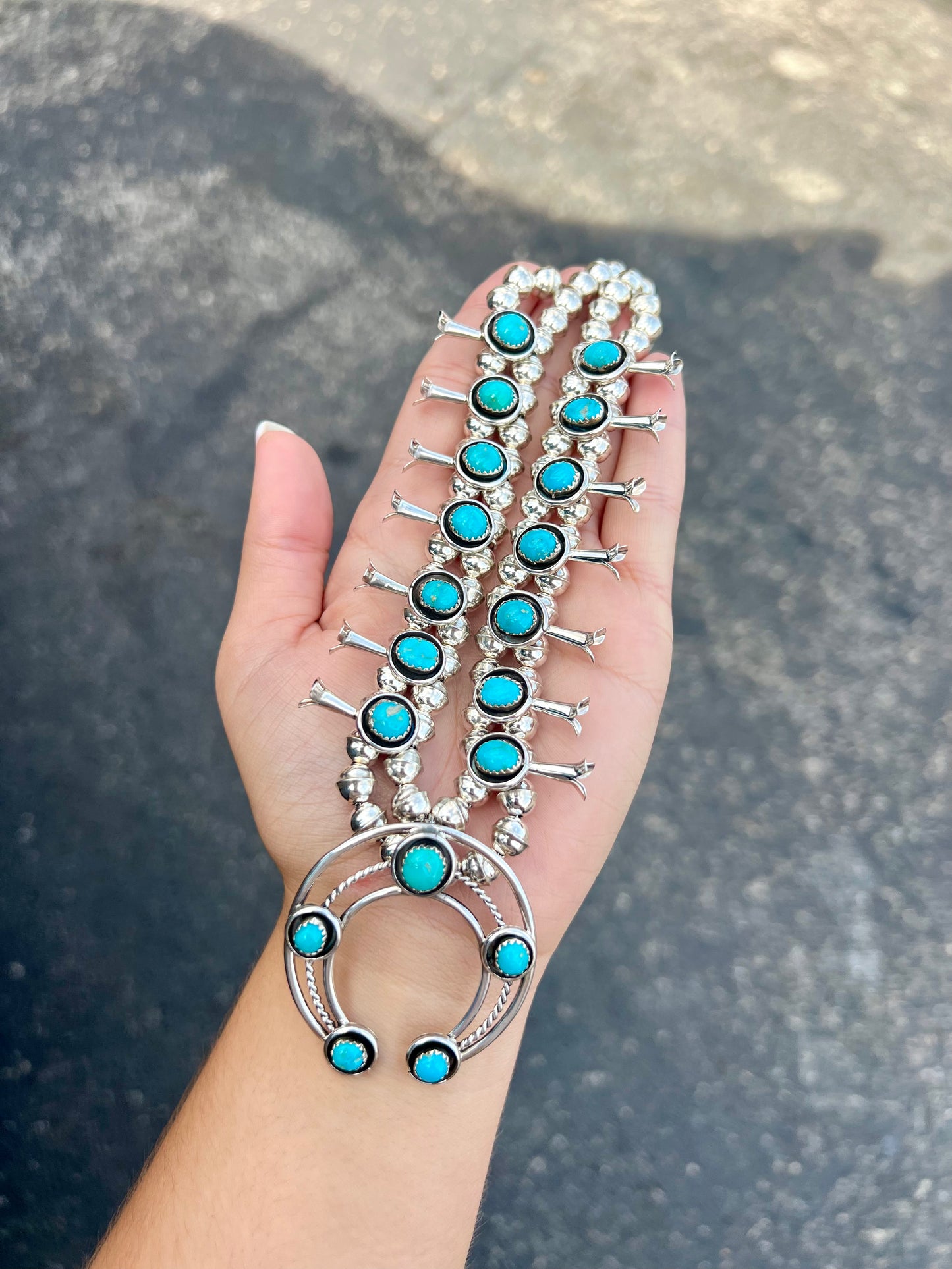 The Trudy Genuine Turquoise Sterling Silver Squash Blossom Necklace and Earrings Set