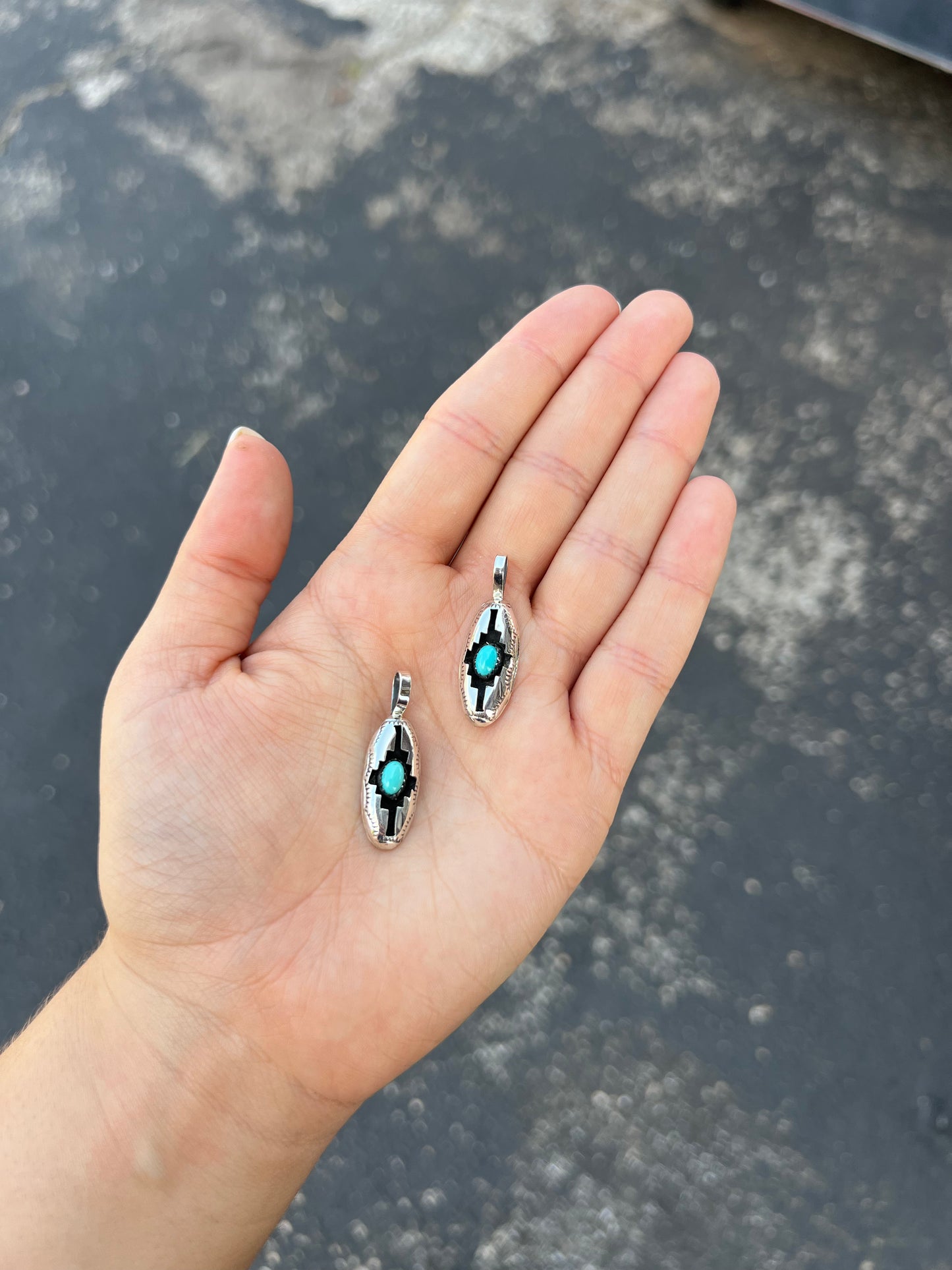 The Wynonna Genuine Turquoise Oval Aztec Shadowbox Sterling Silver Pendant