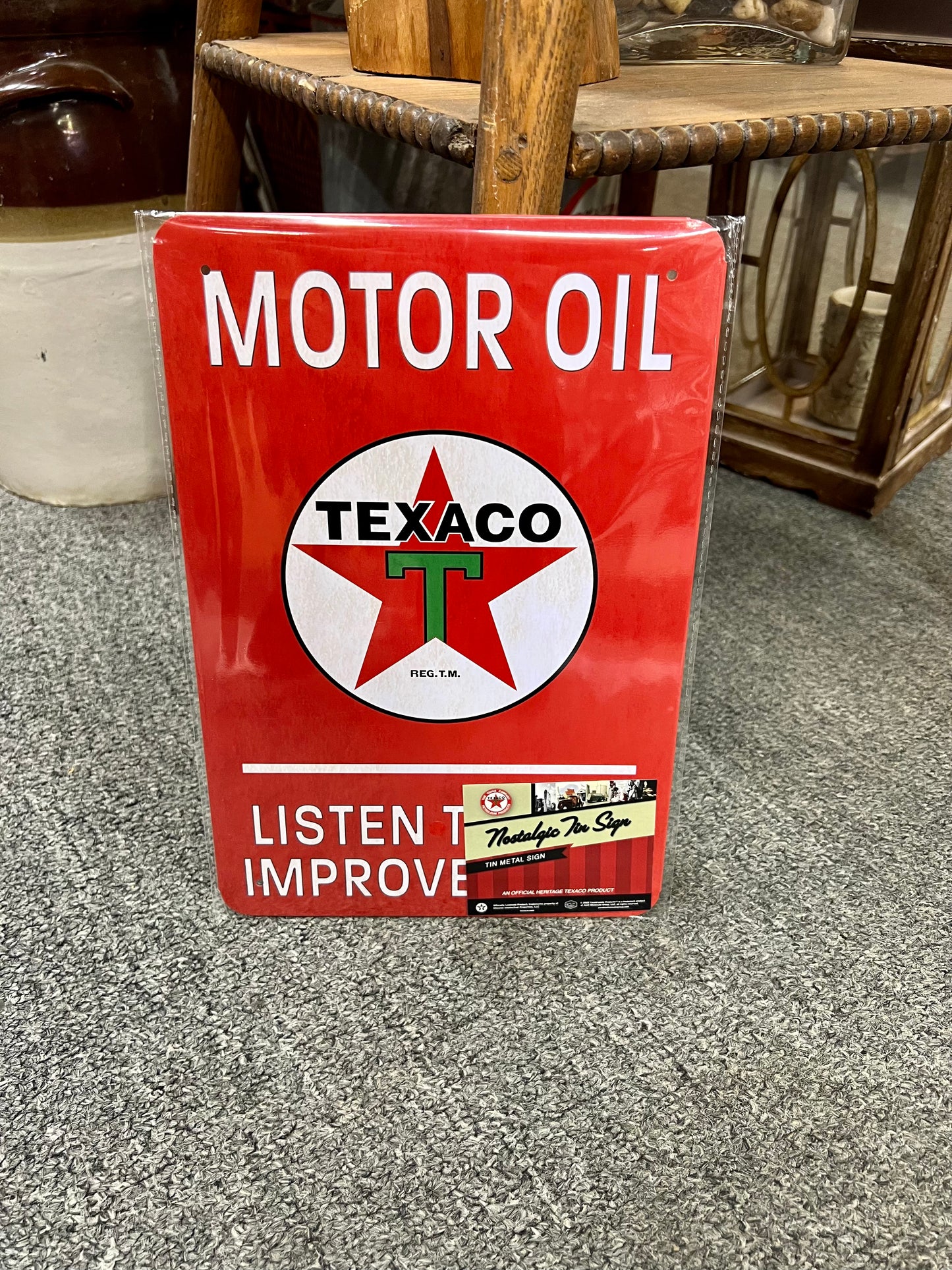 Texaco Listen to the Improvement Metal Sign