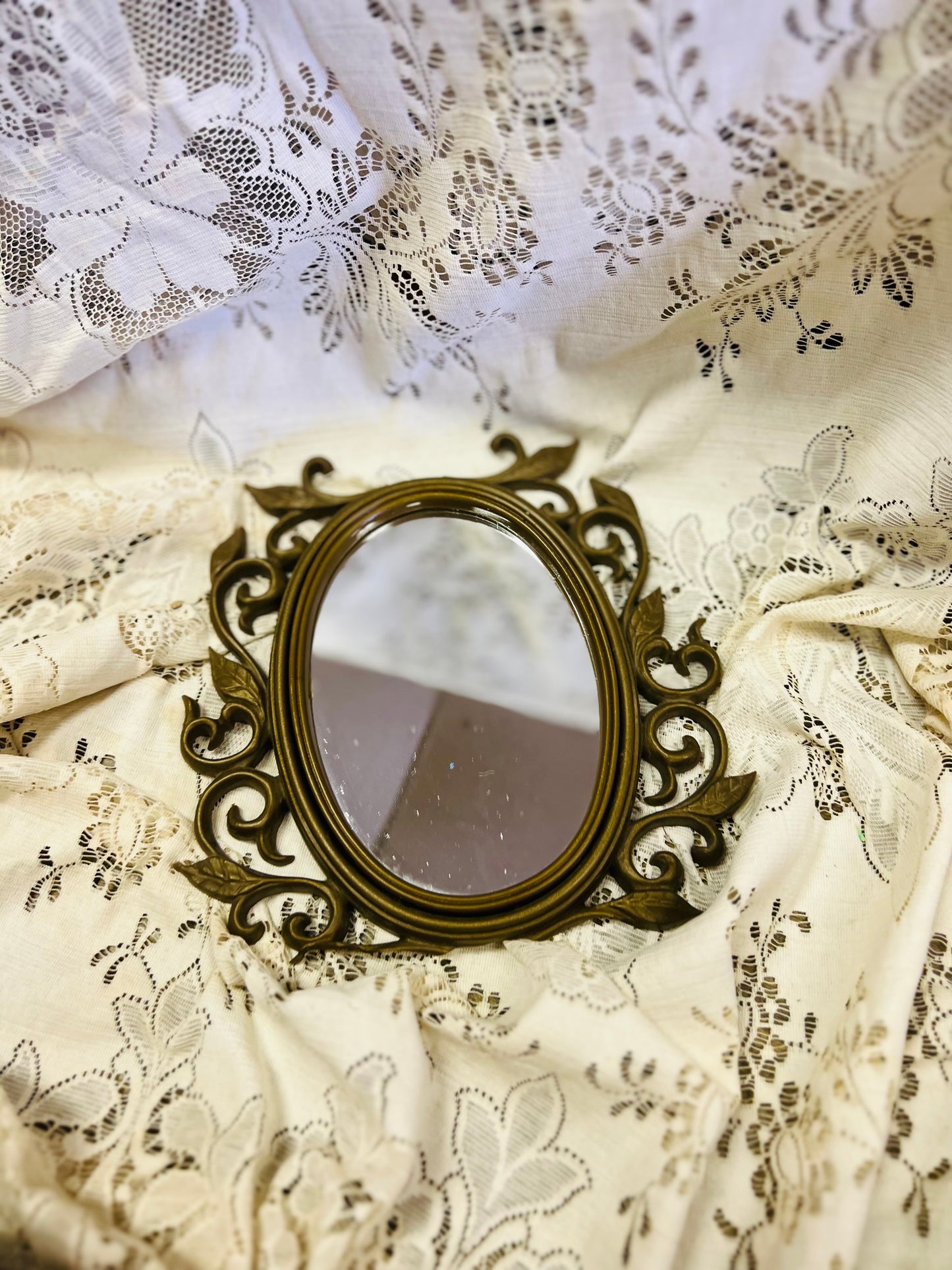 Old Mirror with Gold Scrolling Leaf Detail Frame