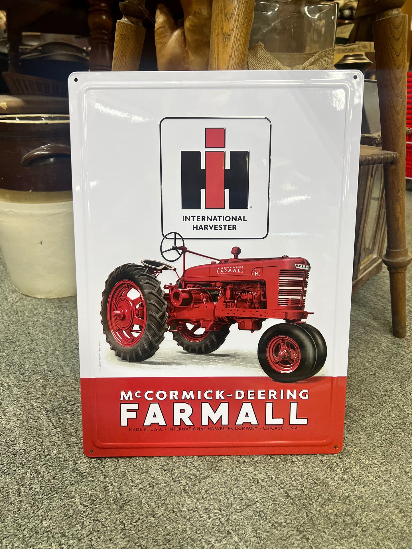 Red and White International Harvester Metal Sign