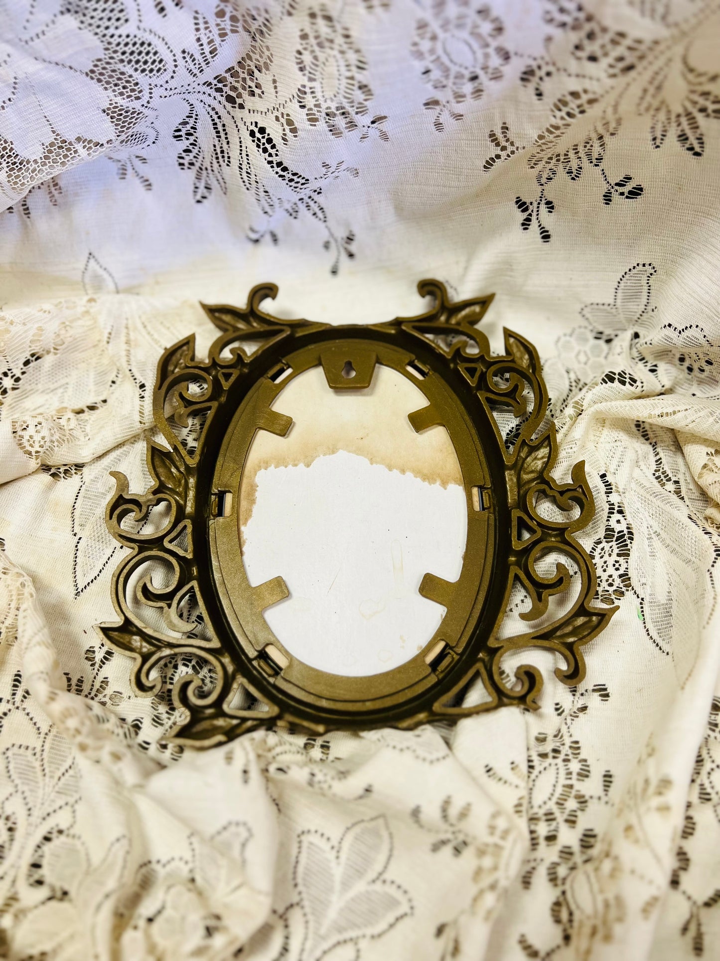Old Mirror with Gold Scrolling Leaf Detail Frame