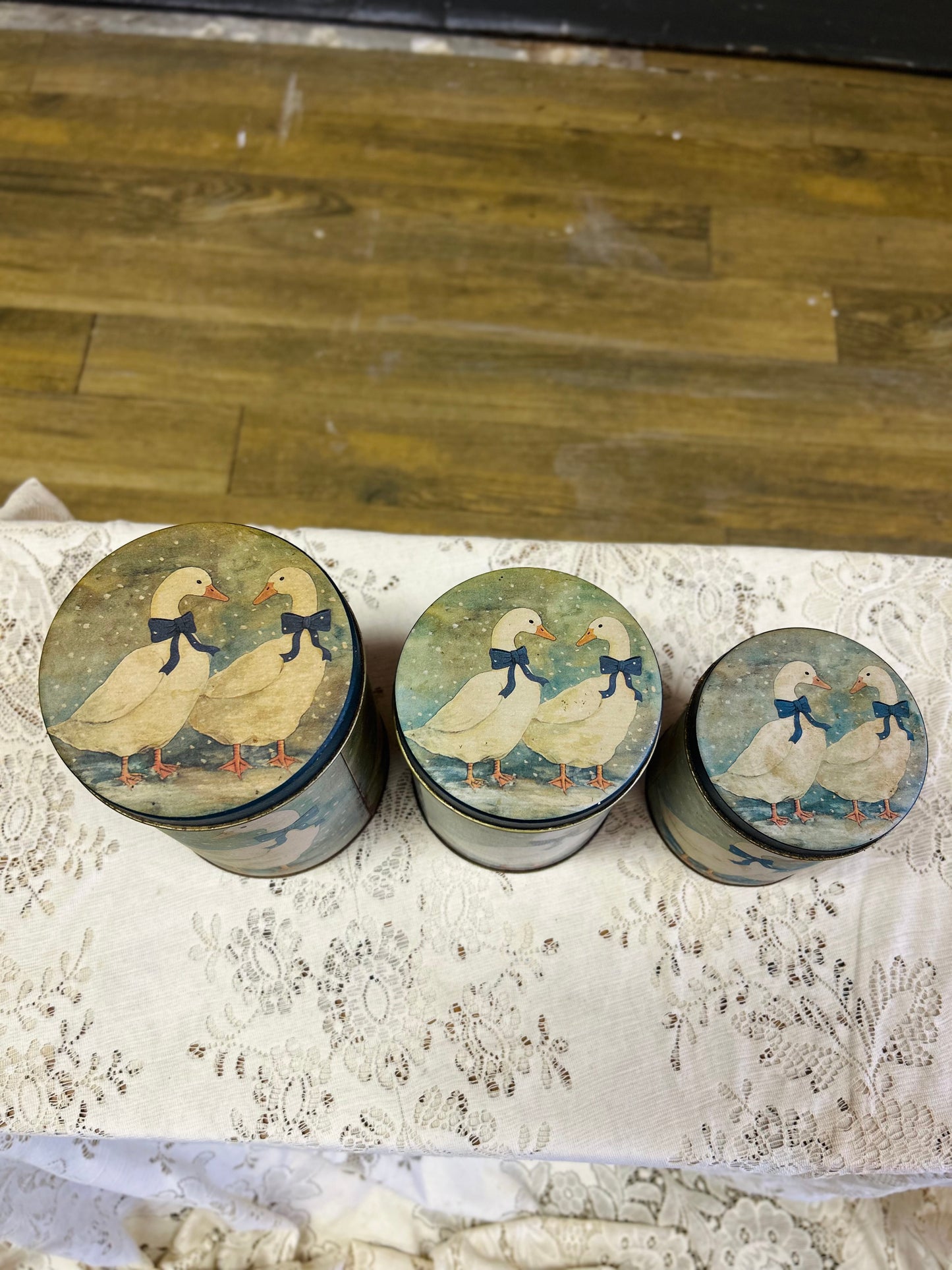 Vintage Nesting Tin Canisters With White Geese With Blue Bow Design