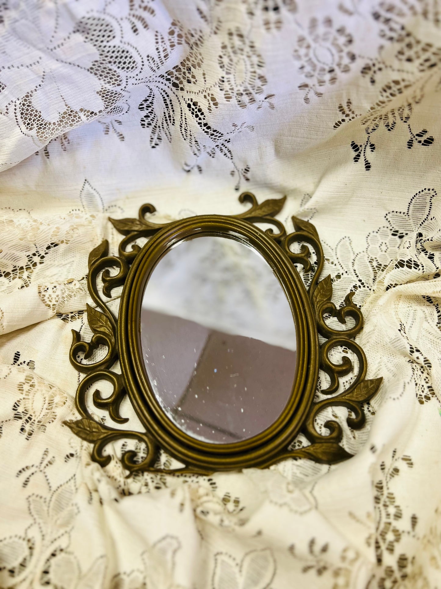Old Mirror with Gold Scrolling Leaf Detail Frame