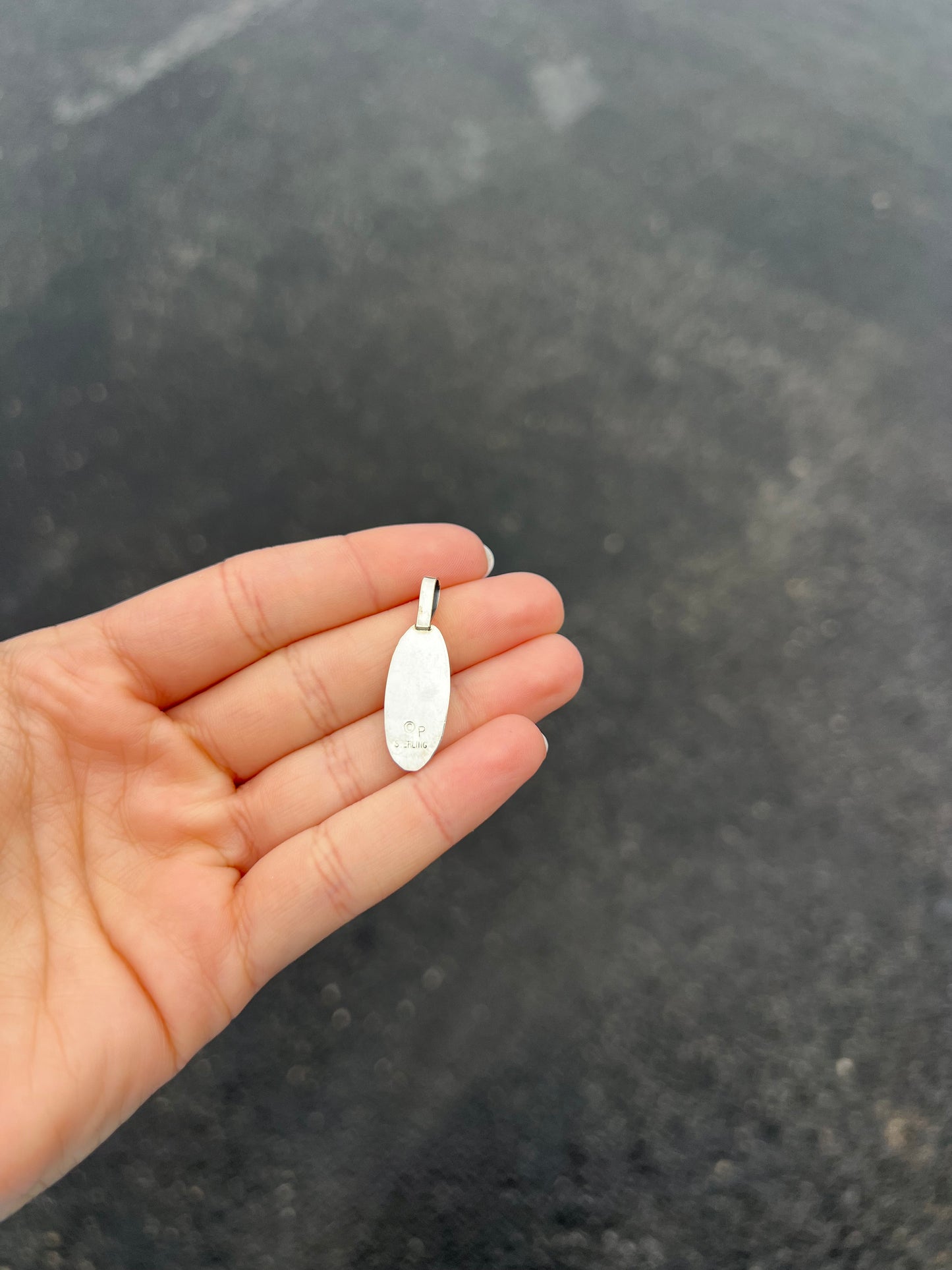 The Wynonna Genuine Turquoise Oval Aztec Shadowbox Sterling Silver Pendant