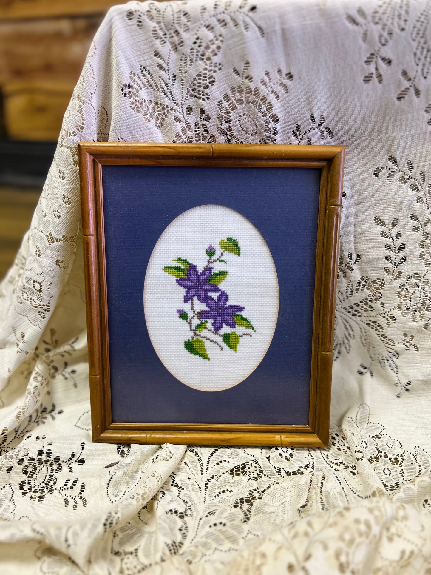 Vintage Cross Stitch Purple Flowers Framed Print - Blue Background
