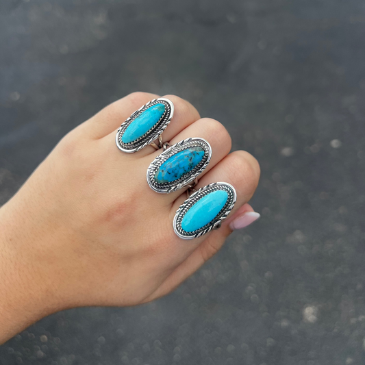 Oval Kingman Turquoise Ring with Stamped Border