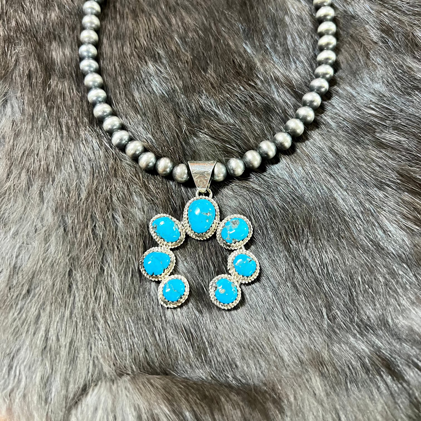 Genuine Turquoise Naja Pendant