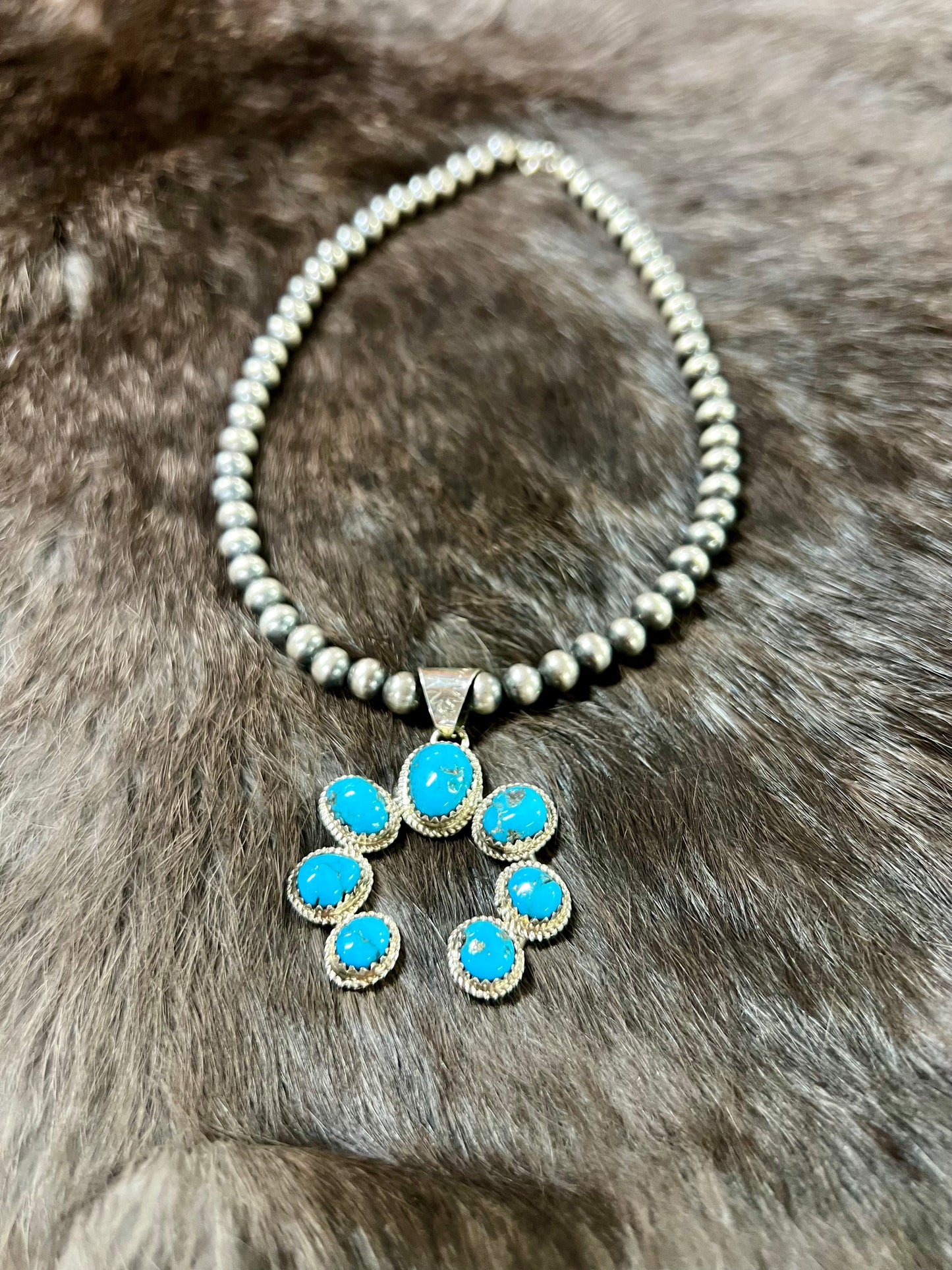 Genuine Turquoise Naja Pendant