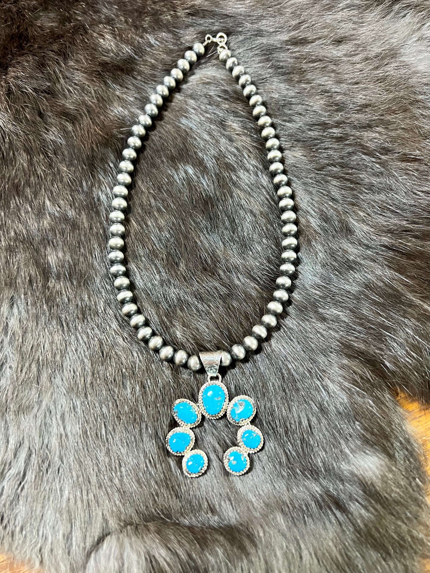 Genuine Turquoise Naja Pendant