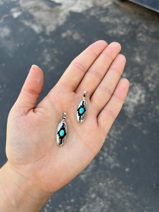 The Wynonna Genuine Turquoise Oval Aztec Shadowbox Sterling Silver Pendant