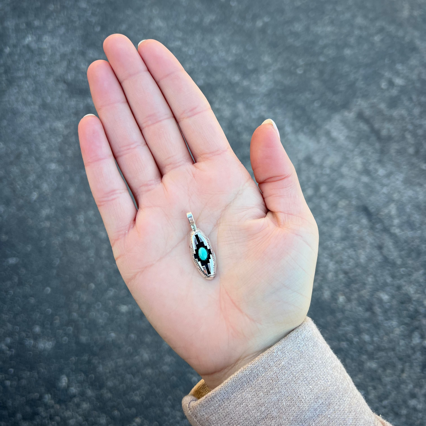 The Wynonna Genuine Turquoise Oval Aztec Shadowbox Sterling Silver Pendant